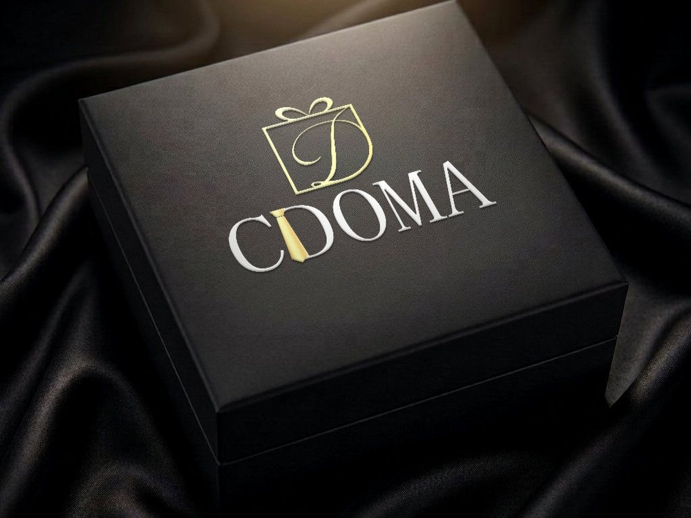 باکس هدیه CDOMA — لوگوی برند روی جعبه مشکی